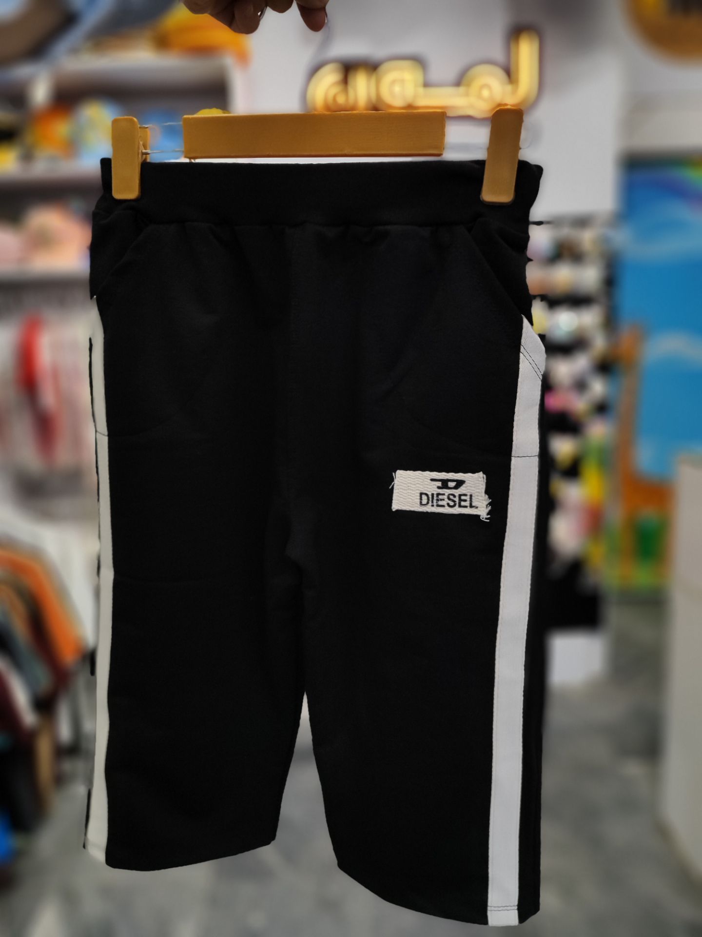 شلوارک مشکی کنار نواردار395 سایز60تا70